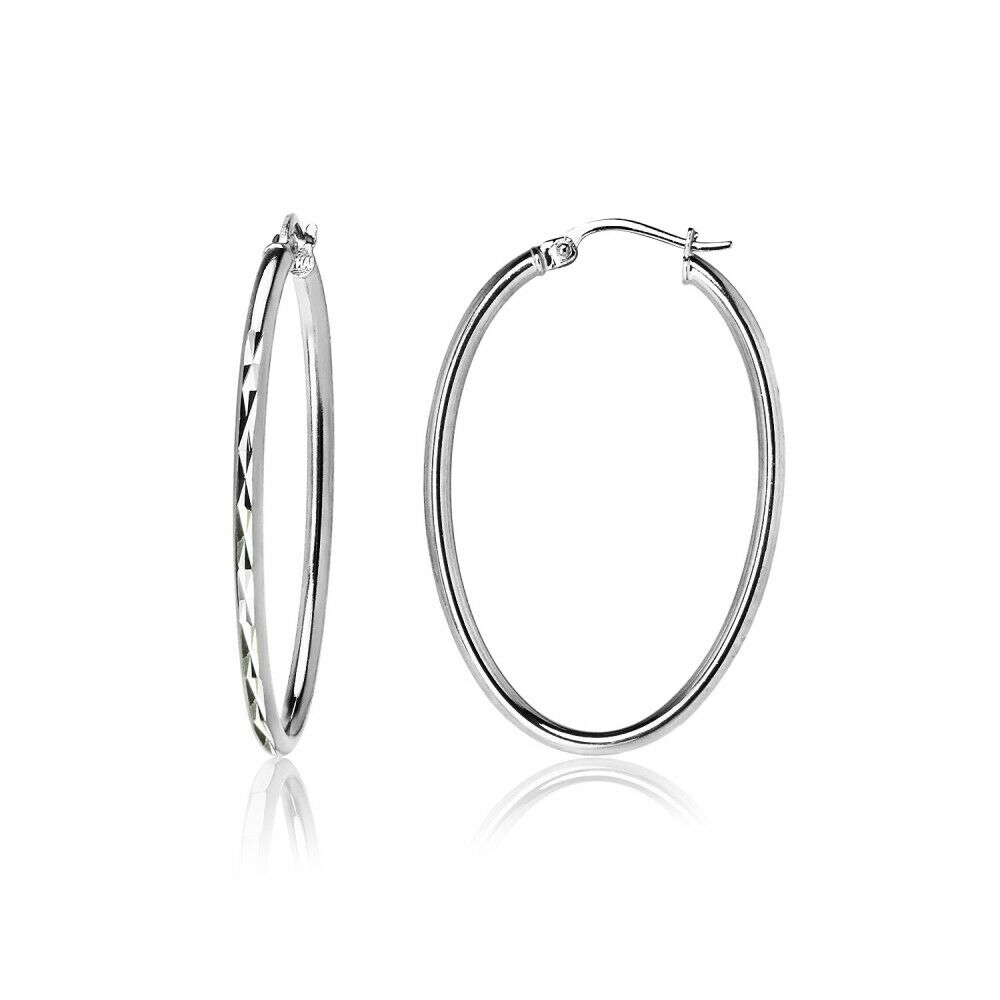 Elsa Peretti™ Diamond Hoop earrings in sterling silver with diamonds,  medium. | Tiffany & Co.